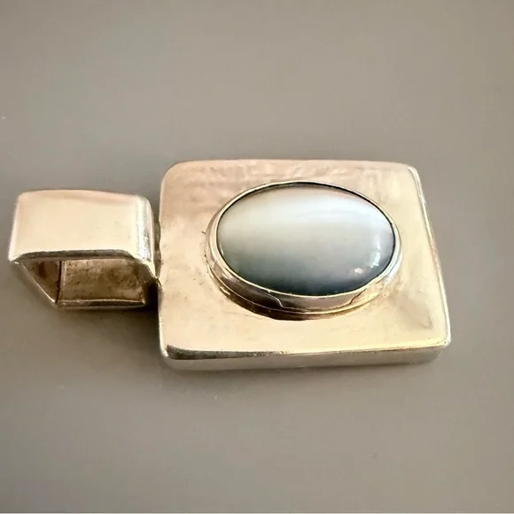 Mexico Blue Cats Eye Sterling Silver Pendant
18 Grams - Picture 3 of 5